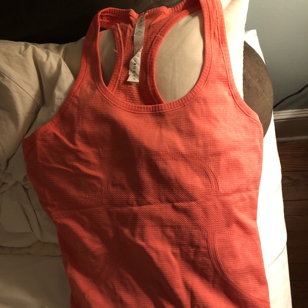 Size 8 Orange swiftly tank top. Lululemon